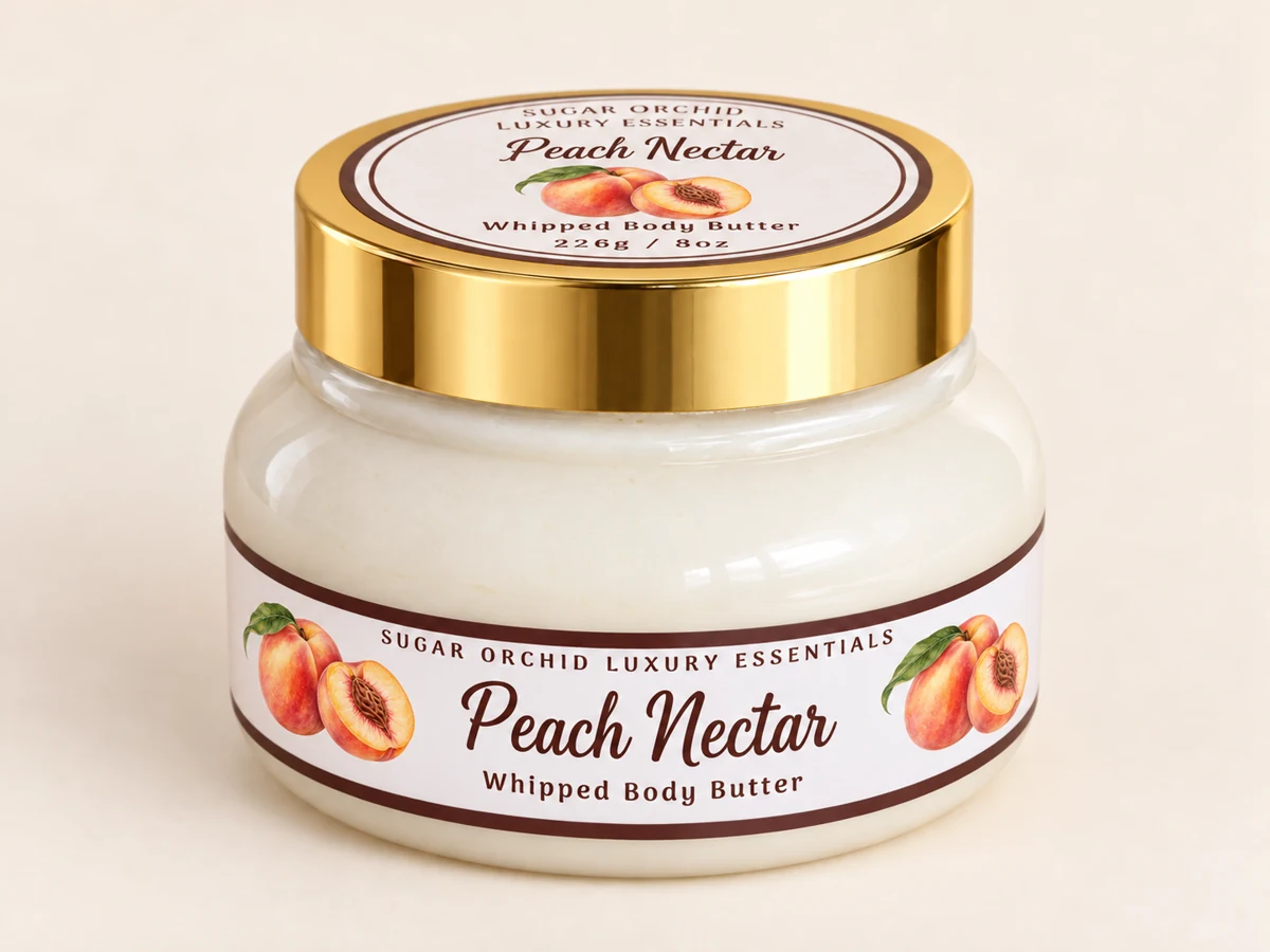 Closed gold-lid jar of Peach Nectar Body Butter