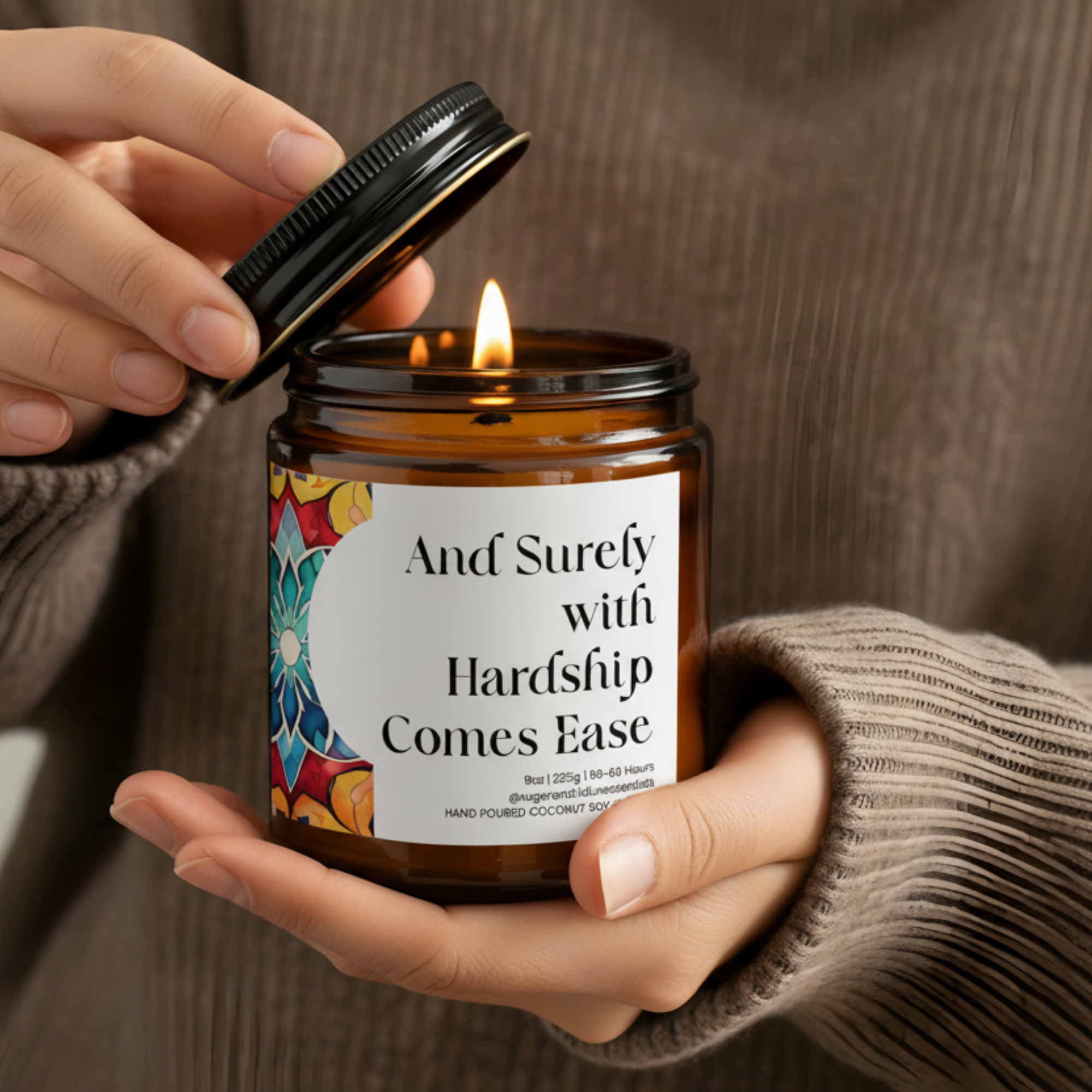“And Surely With Every Hardship Comes Ease” Islamic soy candle in amber glass jar on a neutral décor tray